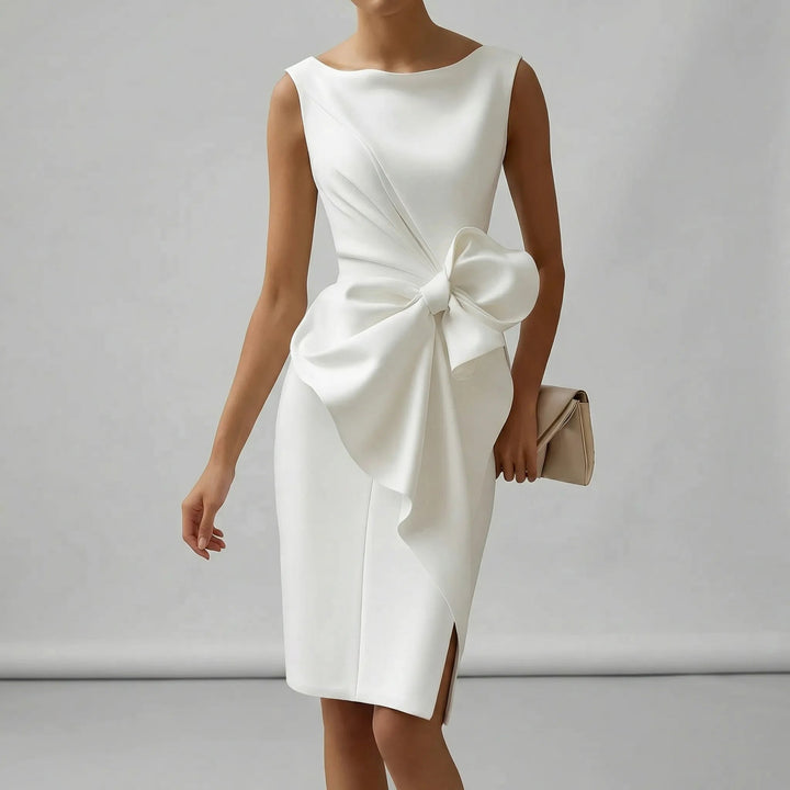 Back view of the timeless bow detail midi dress, perfect as a wedding guest outfit