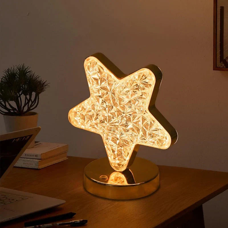 Celestia crystal table lamp casting ambient starry light in a cozy bedroom