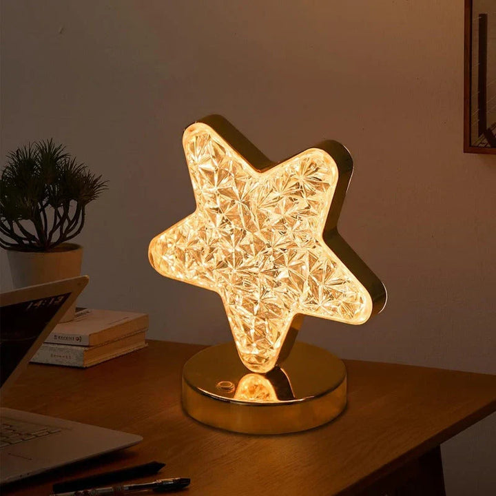 Celestia crystal table lamp casting ambient starry light in a cozy bedroom