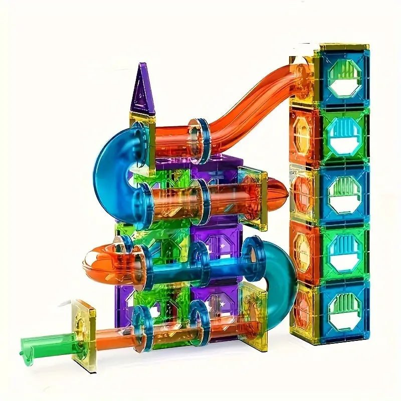 Colorful magnetic building blocks assembled into a race track with transparent tubes