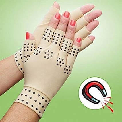 Close-up of therapeutic copper infused arthritis gloves with open fingers