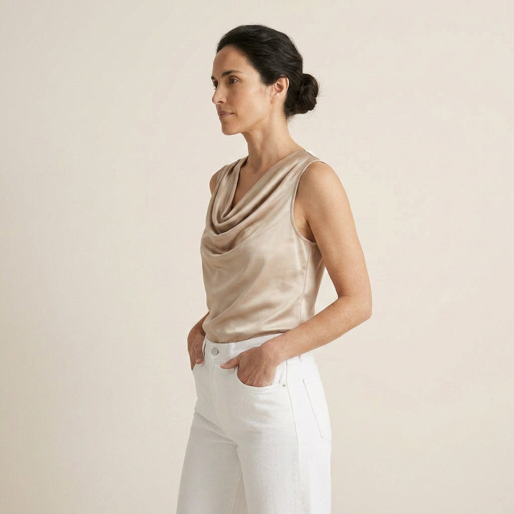 Model wearing the elegant cascade neckline satin top paired with summer fashion trousers