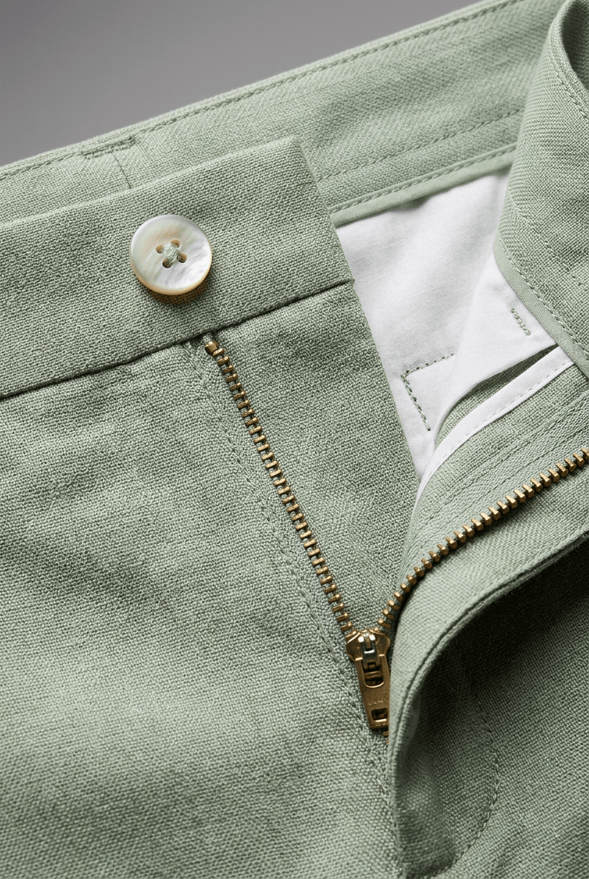 Close-up of notch lapel detail on men's slim fit business suit jacket