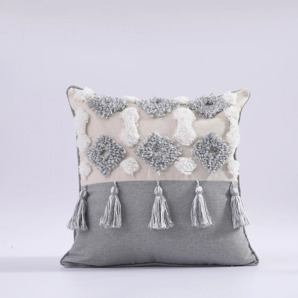 Close-up of textured tufted pillow cover in boho style