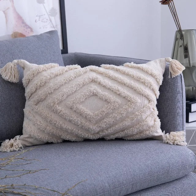 Cozy sofa accessory featuring boho tufted pillow design