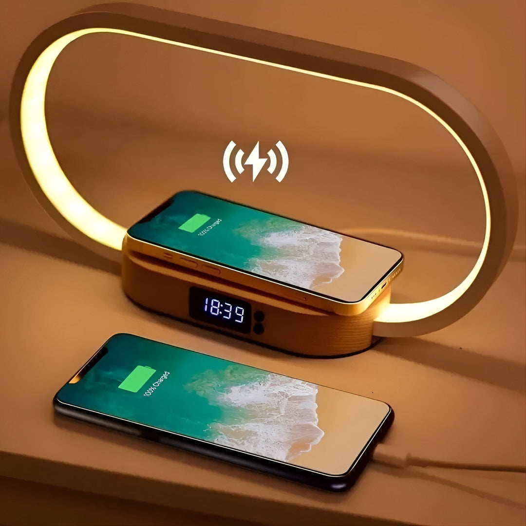 Smartphone charging wirelessly on the base of the 3-in-1 LED desk lamp