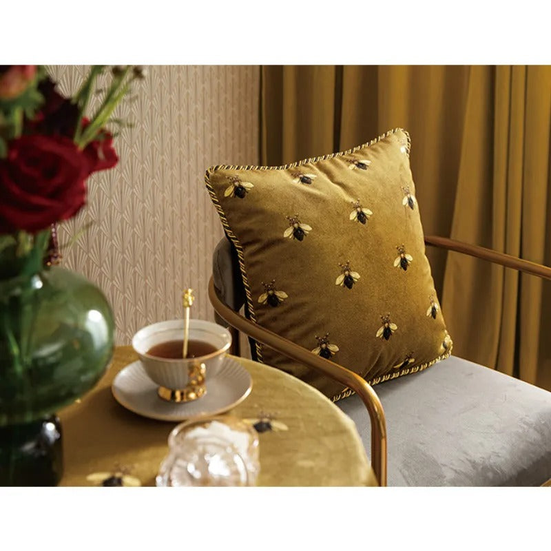 Luxury throw pillow cover featuring embroidered golden bee design