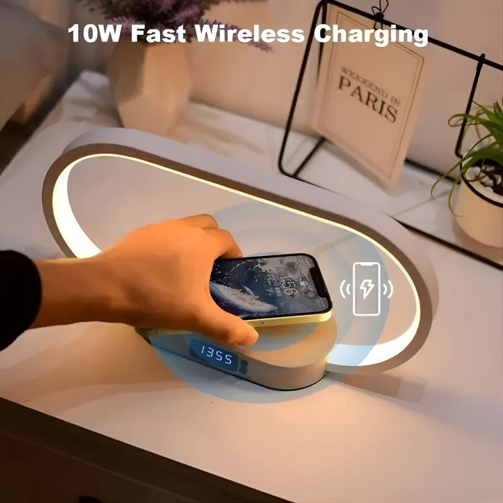 Modern LED desk lamp with wireless charging pad and digital alarm clock display