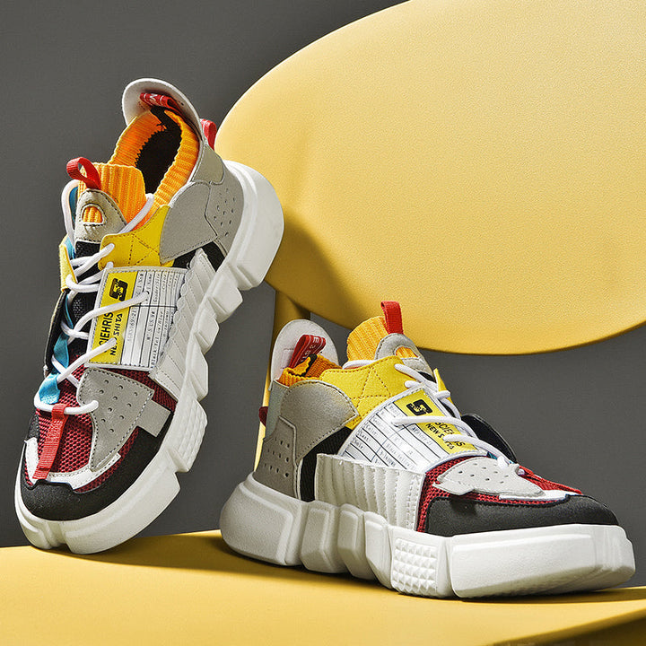 Top-down view of men's modern trainers displaying laces and insole