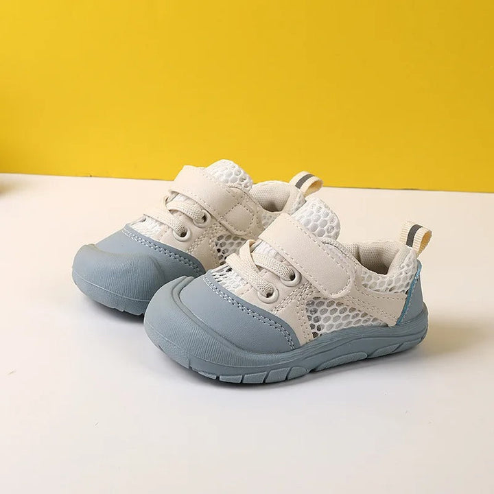 Children's flexible barefoot walking shoes in blue and beige side profile