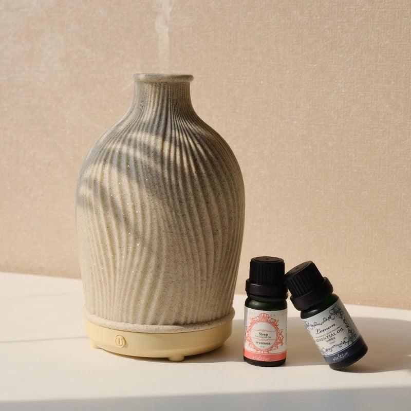 BohoMist ultrasonic aroma diffuser side profile showing textured pattern and soft glow.