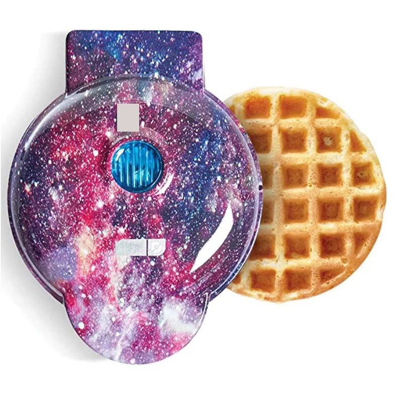Compact galaxy patterned mini waffle maker with freshly baked waffle
