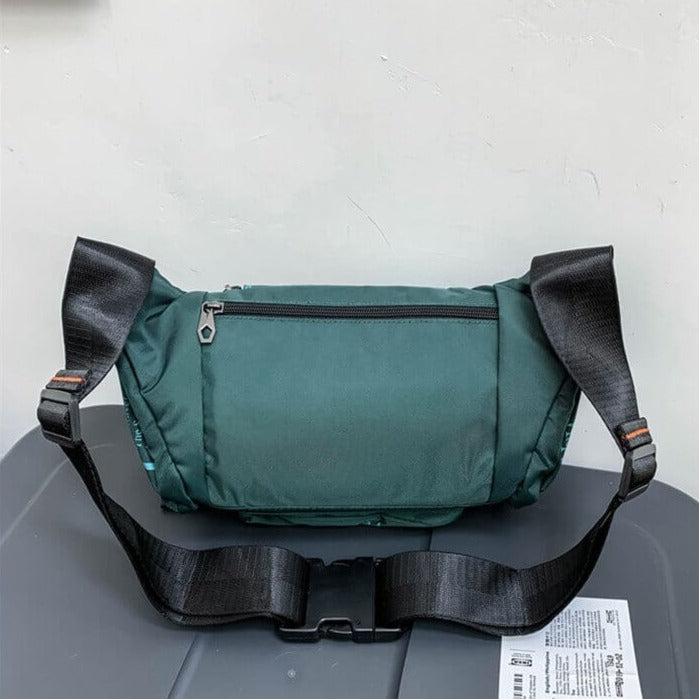 Compact outdoor pack designed for men, featuring durable water-resistant fabric.