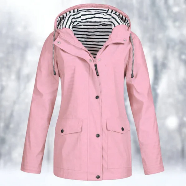 Womens waterproof raincoat featuring button front and deep hood