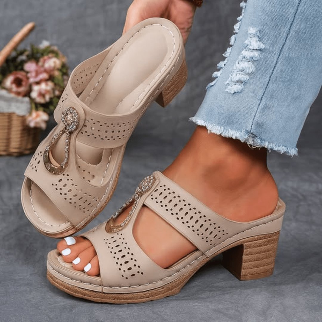 Close-up of women's comfort sandals showing premium strap and buckle detail
