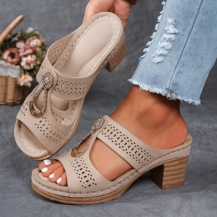 Close-up of women's comfort sandals showing premium strap and buckle detail
