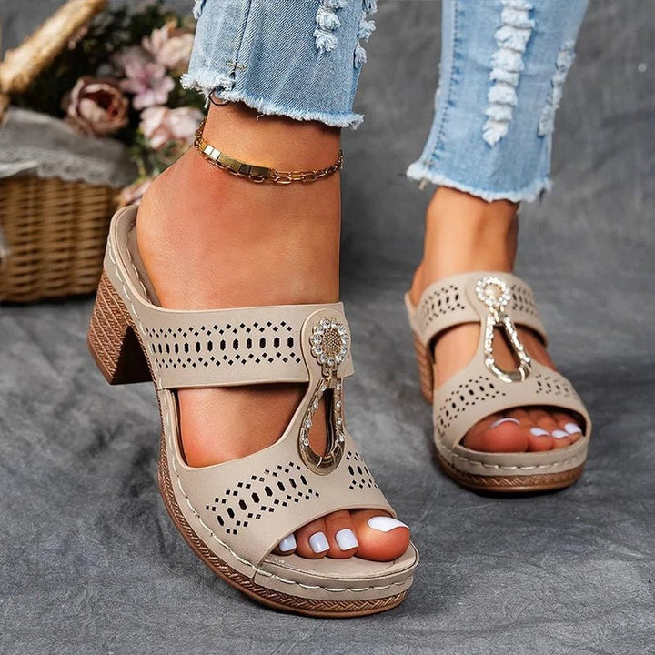 Chic women's comfort sandals highlighting textured anti-slip outer sole