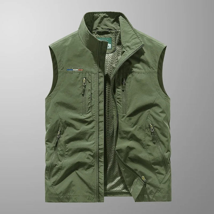 Close up of the zipper and secure pockets on a mens travel vest designed for hiking.