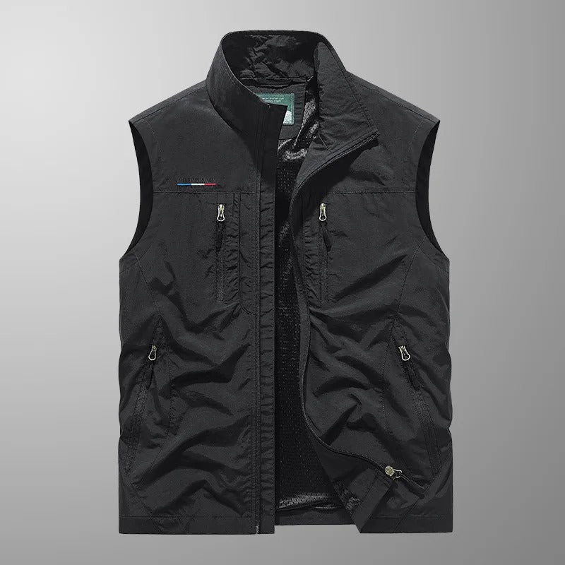 Men's full zip utility vest in black shown from the front