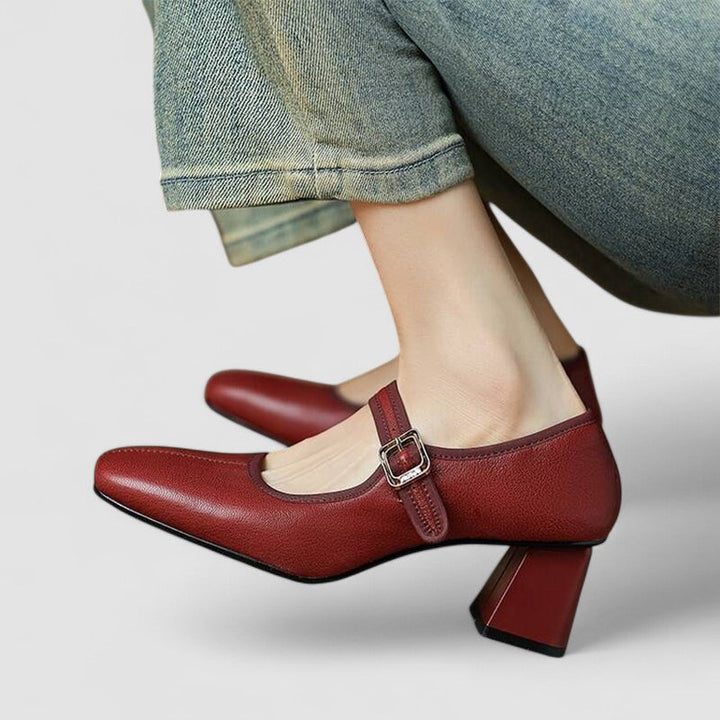 Red Mary Jane block heel shoes viewed from the side