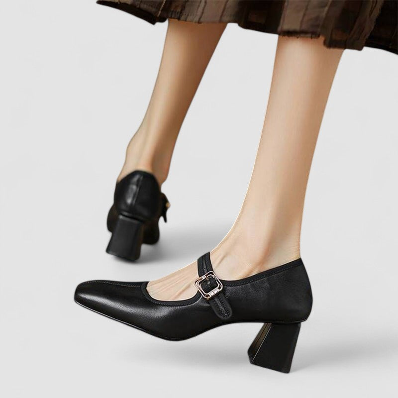 Black Mary Jane block heel shoes showcasing back and side profile