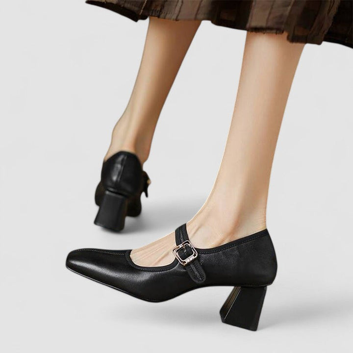 Black Mary Jane block heel shoes showcasing back and side profile