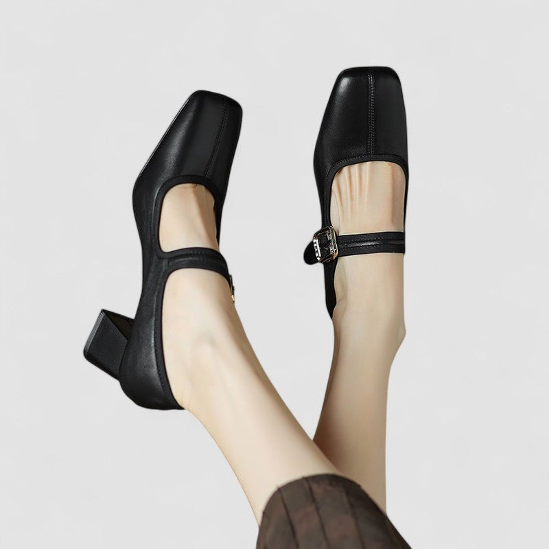 Stylish black women's footwear featuring orthopedic arch support