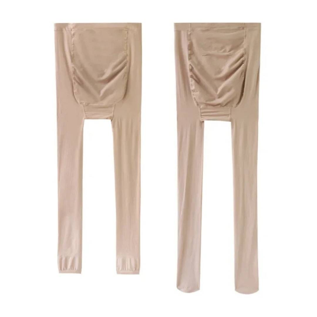 Close-up fabric detail of black maternity wear compression hosiery showing stretchy material.
