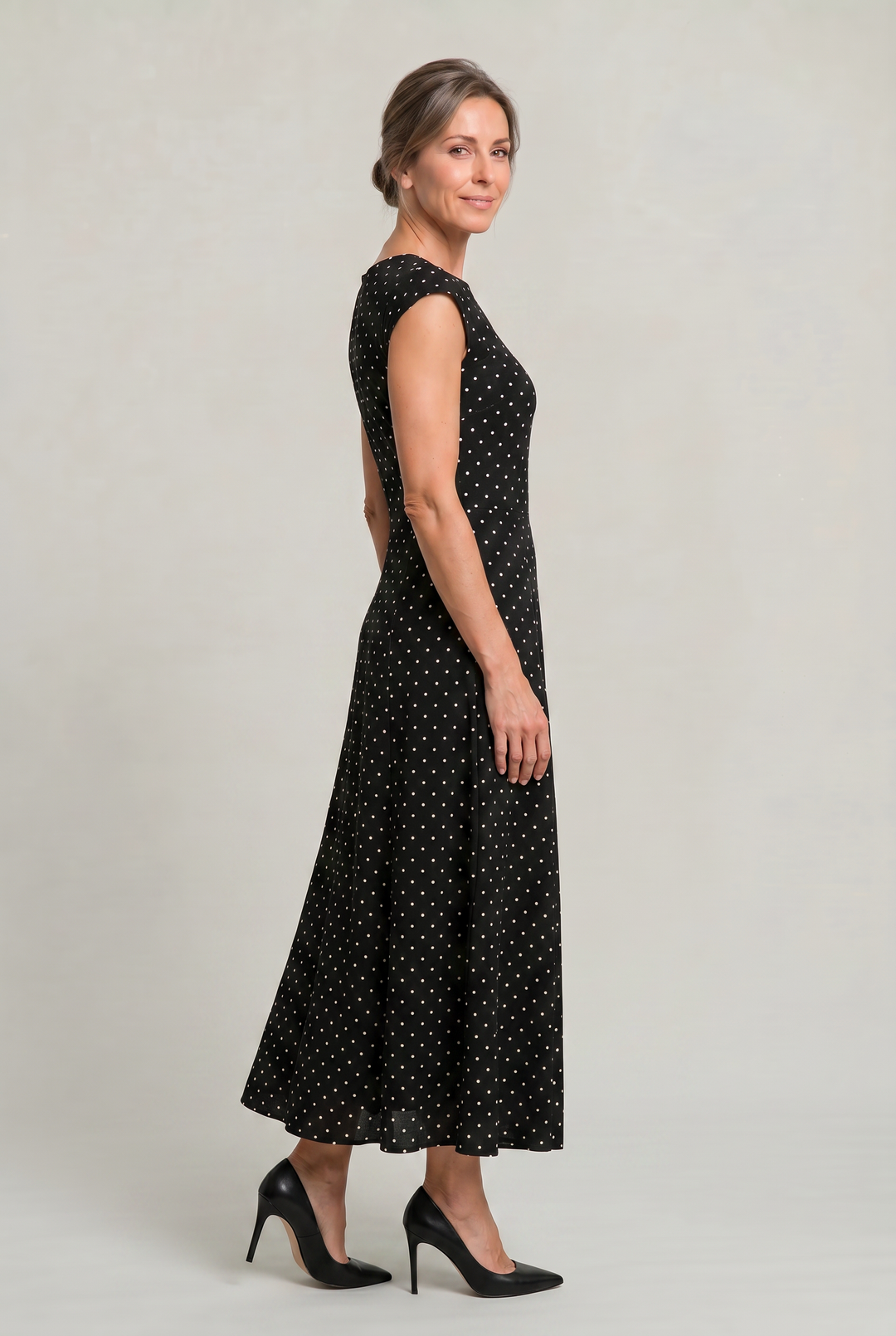 Women's polka dot maxi party dress with cap sleeves in fit and flare style