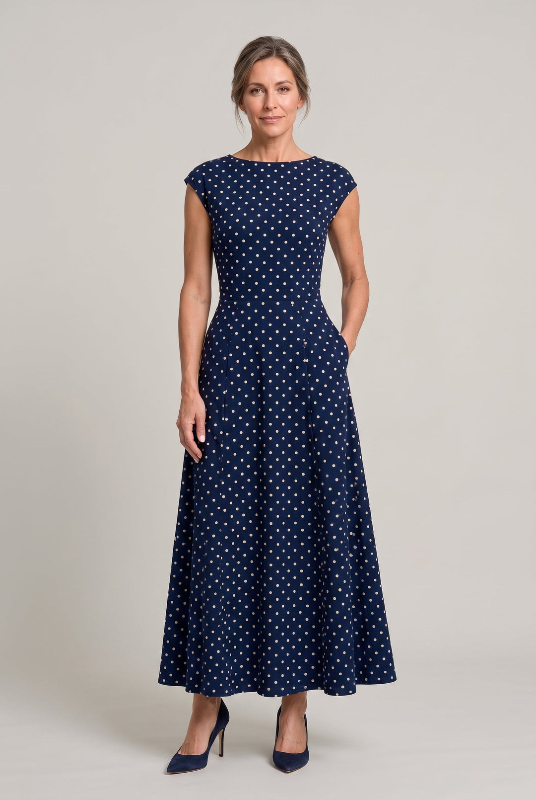 Chic fit and flare party dress in polka dot print for special occasions