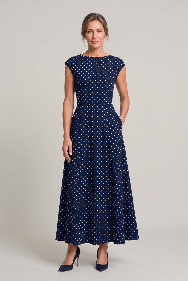 Chic fit and flare party dress in polka dot print for special occasions