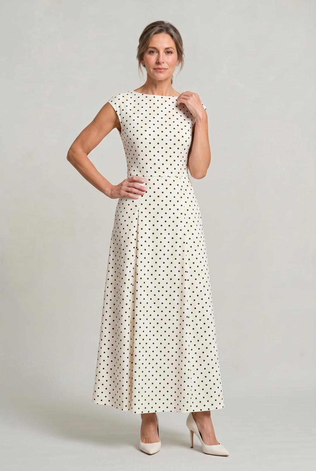Flowing polka dot maxi dress designed for formal events and evening parties
