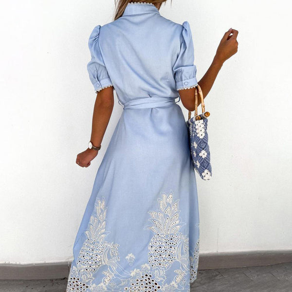 Back view of the light blue embroidered maxi dress showing the flowing silhouette