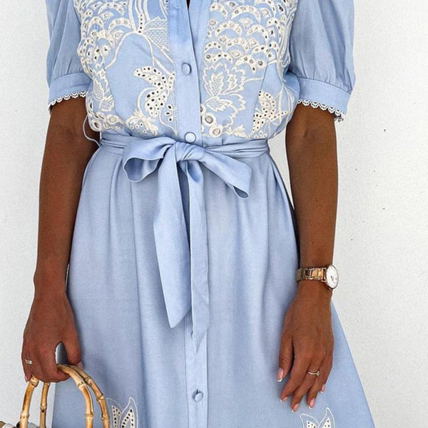 Full length view of women's embroidered maxi dress in light blue