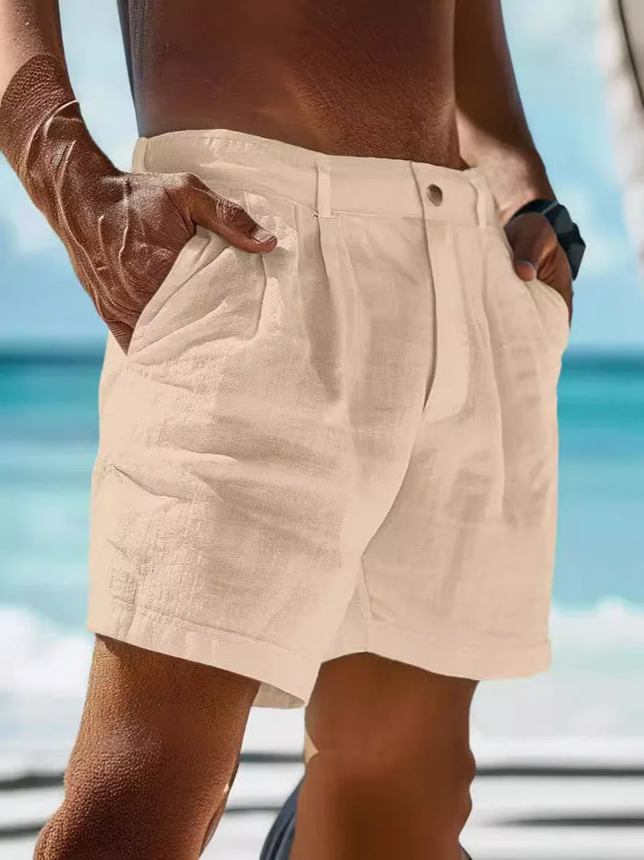 Man wearing khaki breathable summer shorts by the beach