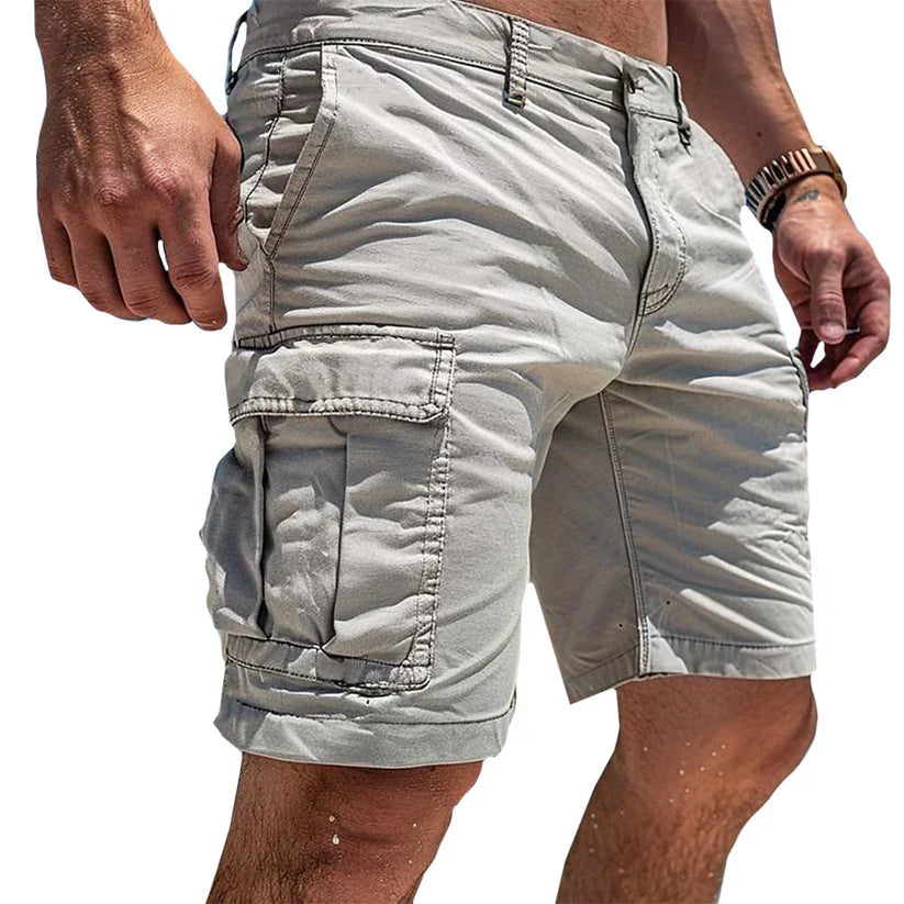 Man wearing white cargo shorts with side utility pockets