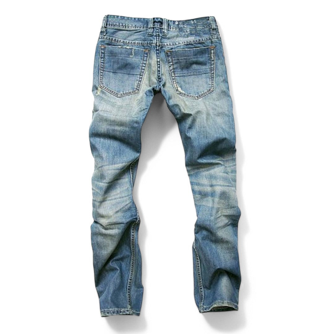 Back view of men's classic blue jeans highlighting rear pockets and waistband construction