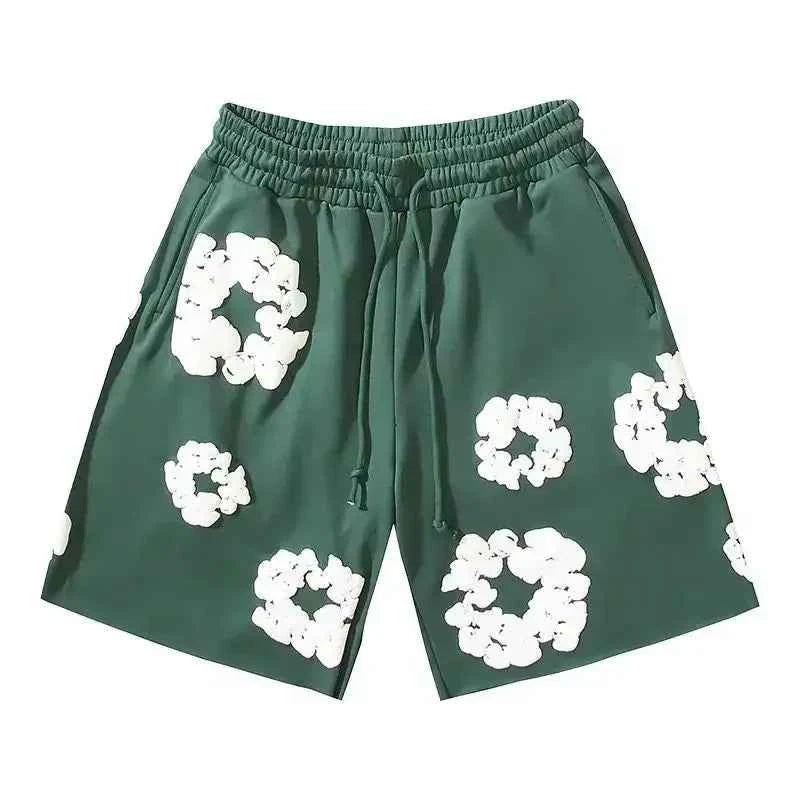 Flat lay of mens casual wear floral shorts for summer fashion