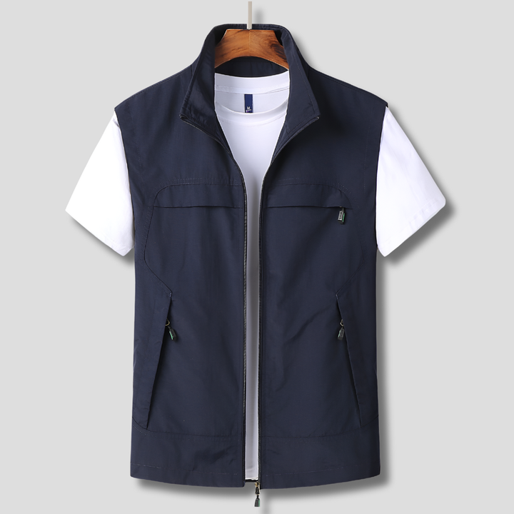 Men's navy quick-dry outdoor vest hanging on a wooden hanger
