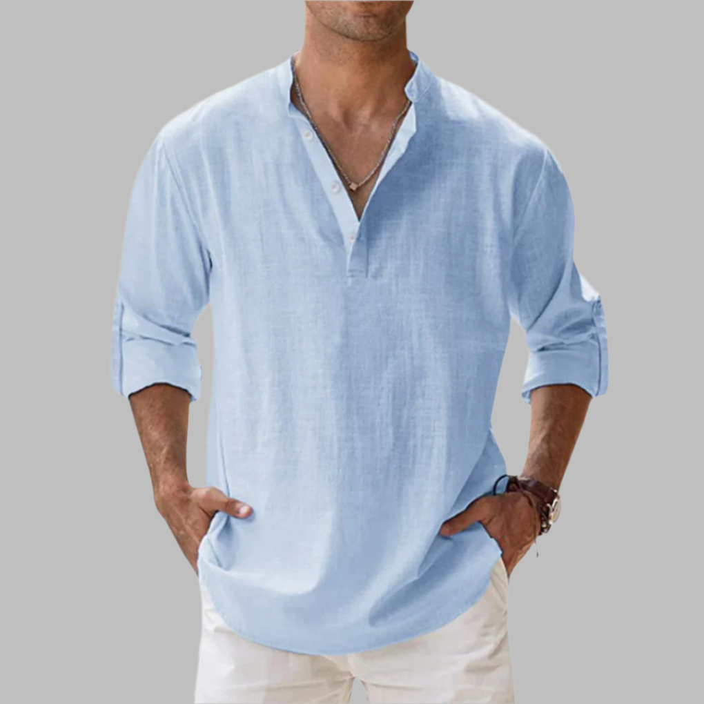 Man wearing light blue long sleeve summer shirt with button placket