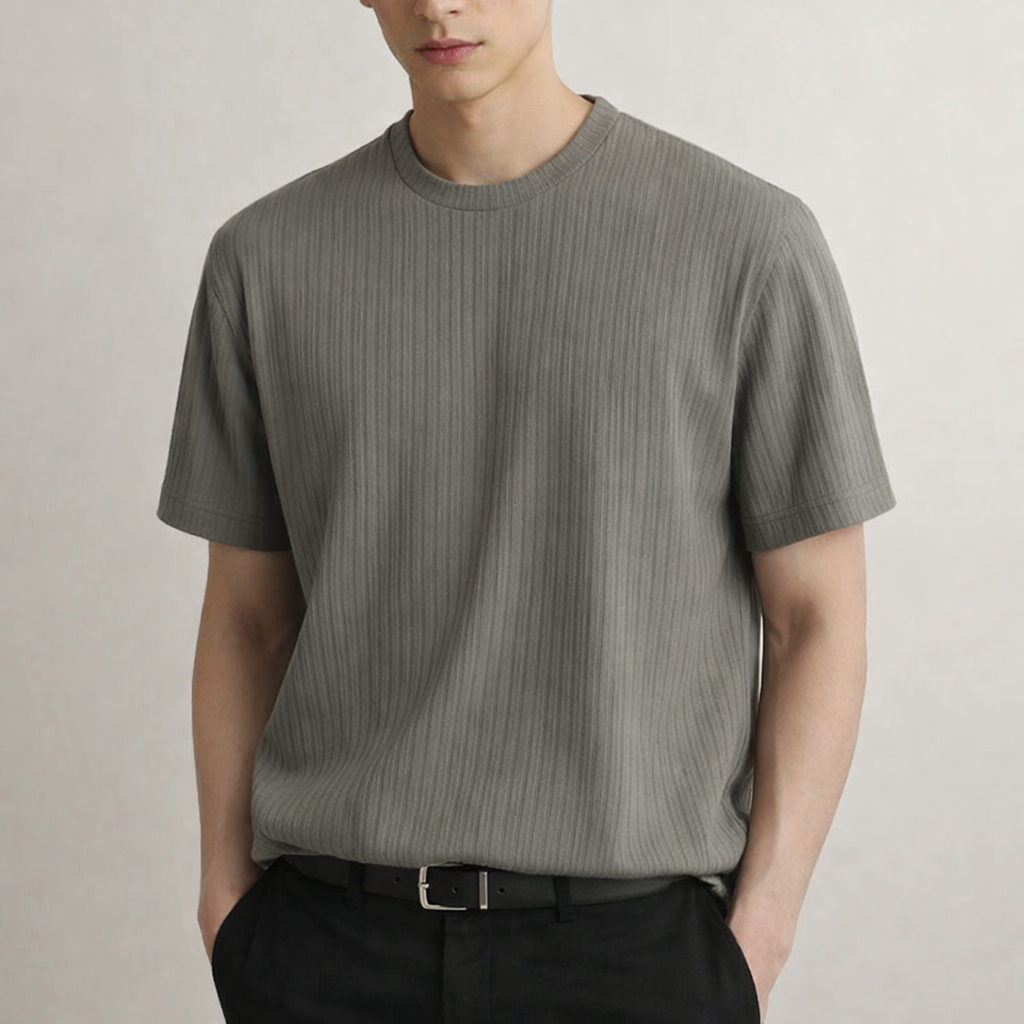 Close-up of textured fabric on men's fitted ribbed tee