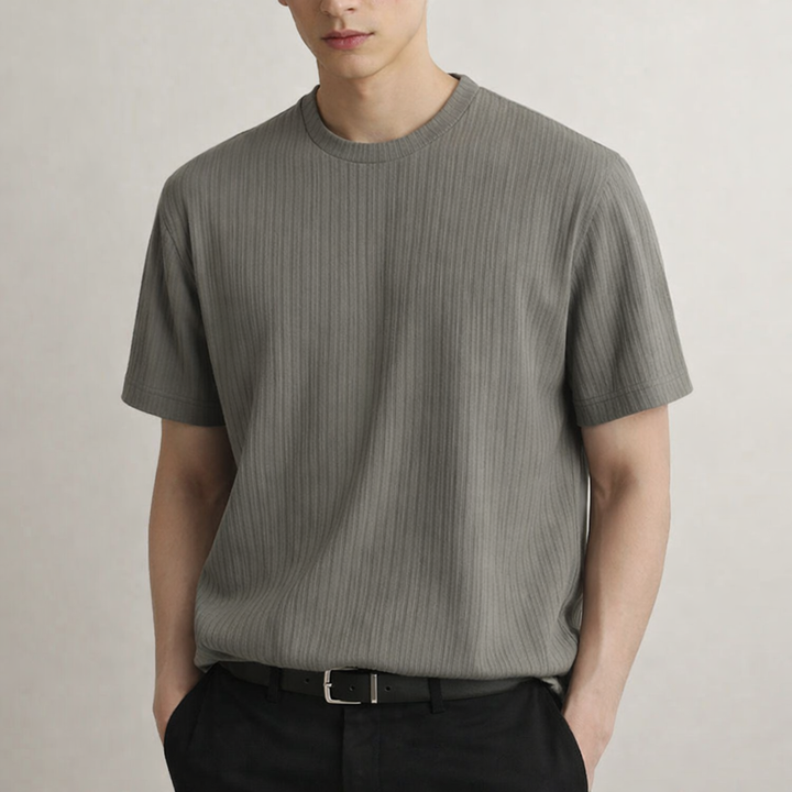 Close-up of textured fabric on men's fitted ribbed tee