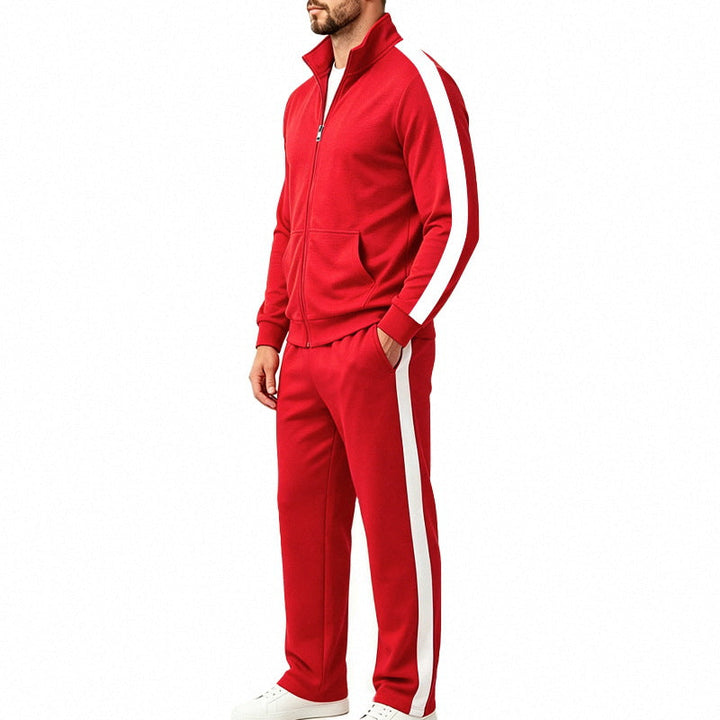 Man wearing a vivid red sports tracksuit set with matching jogging pants