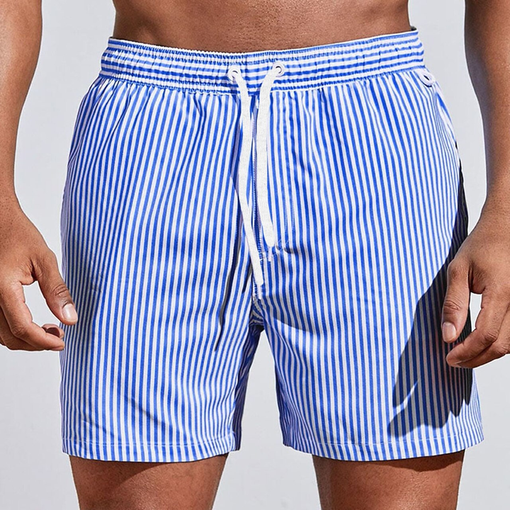 Close-up of quick-dry striped summer swimwear fabric and adjustable drawstring detail