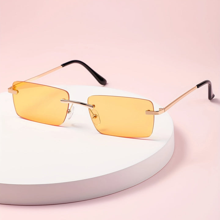 Stylish summer men's accessories showcasing lightweight frameless sunglasses