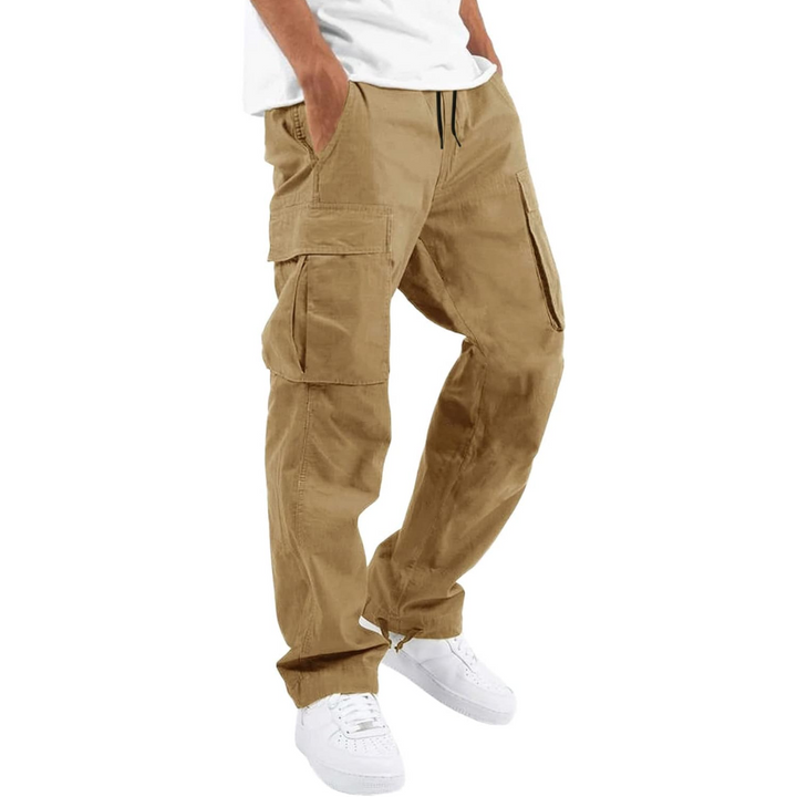 Close-up of utility pocket detail on mens streetwear cargo trousers