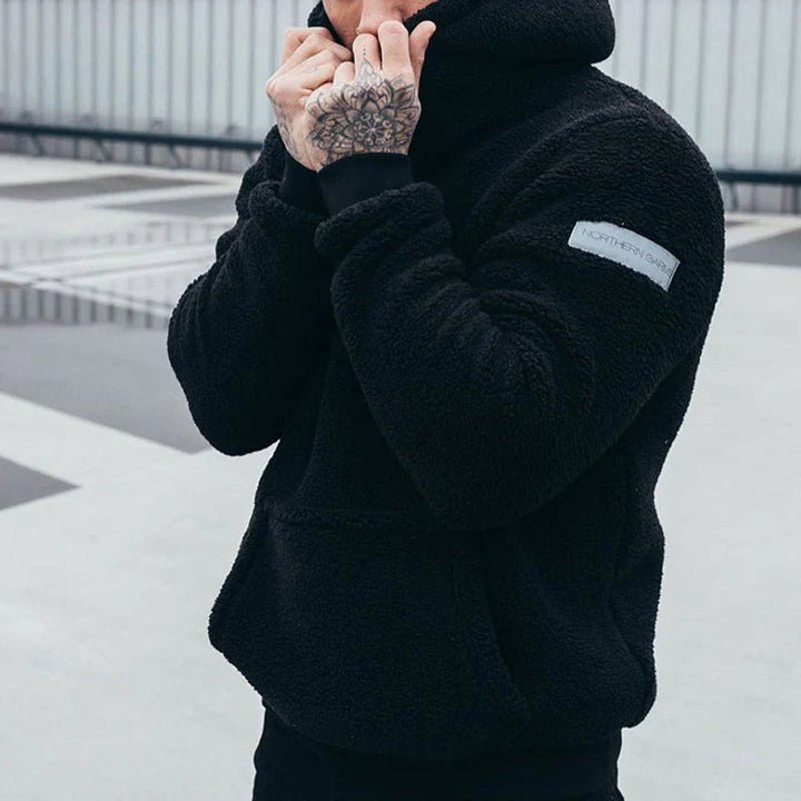 Back view of men's cozy plush hoodie in relaxed fit casual winter wear