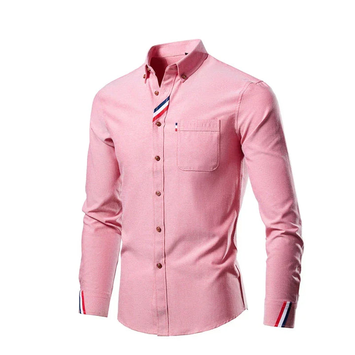 Close-up view of men's button-down shirt fabric and collar, featuring casual chic fashion
