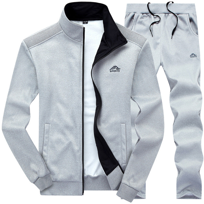 Light grey men's athletic tracksuit set featuring a zip jacket and matching pants