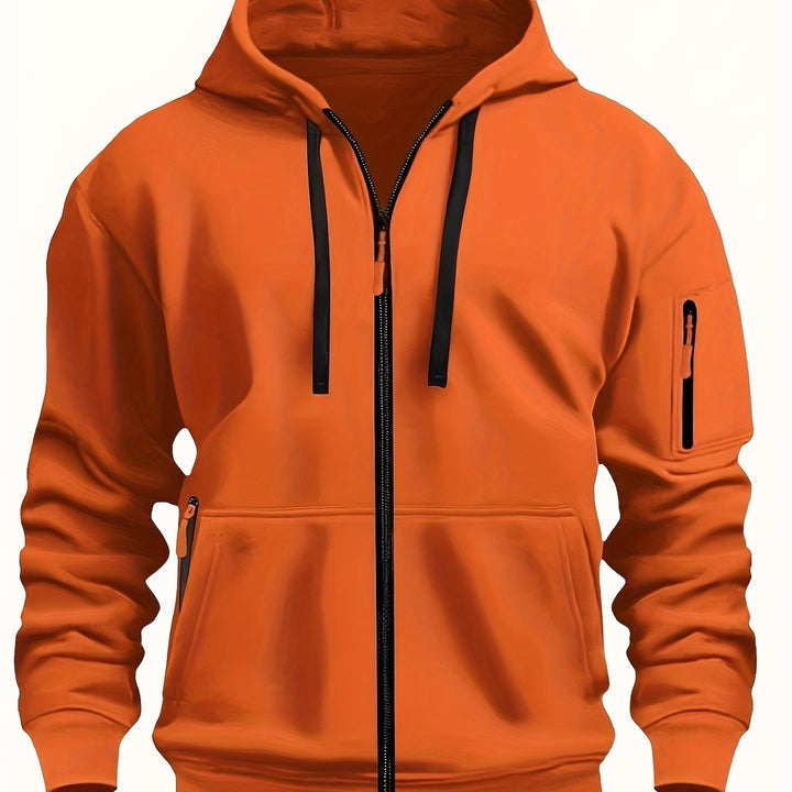 Lifestyle shot of man wearing casual zip up sweatshirt outdoors